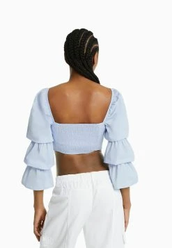 BERSHKA Cropped Long Sleeve- Blouse - Light Blue -dress shop 79de40d8b1e142f9acafba84c43fbaa6